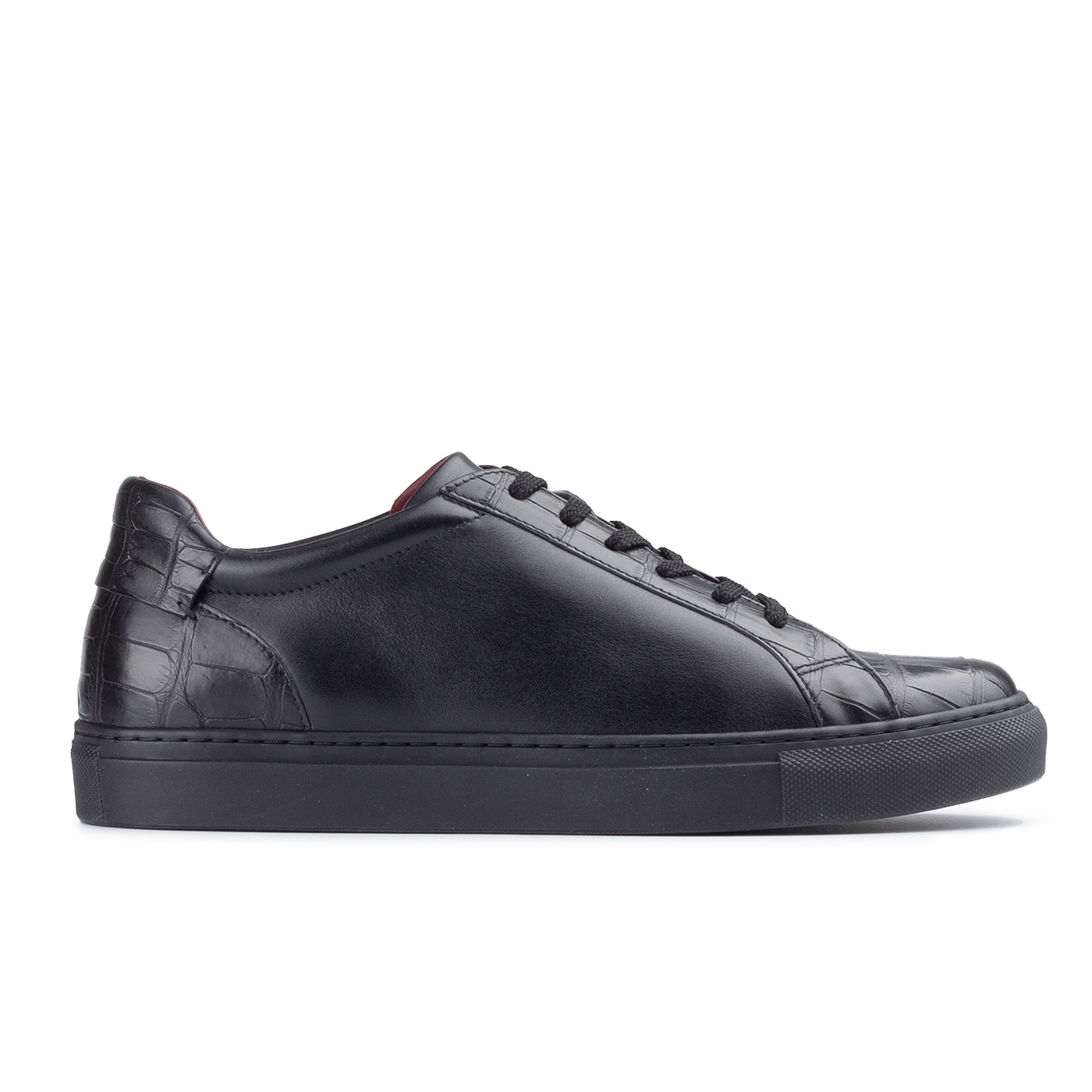 Black sneakers with crocodile leather trim